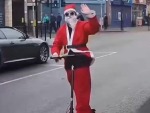 [christmas] eScooter Santa Eats Road
